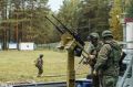 Два десятка резервистов отряда БАРС и несколько «УАЗов» с пулеметными турелями прибыли на полигон под Ижевском на занятия по огневой подготовке
